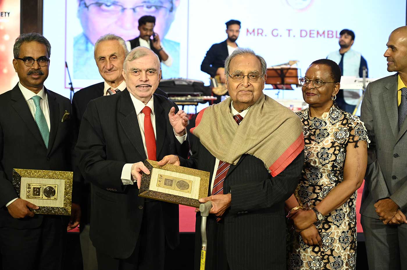 Felicitating Shri. G.T. Dembla, Past Chairman and advisory council member for his contributions to TEI. 